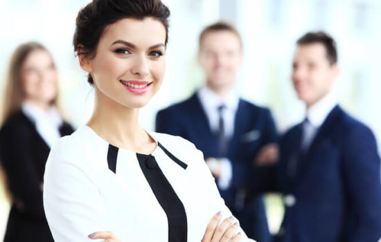 Professional Business Woman with Tailored Suit with Crossarms
