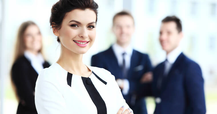 Professional Business Woman with Tailored Suit with Crossarms