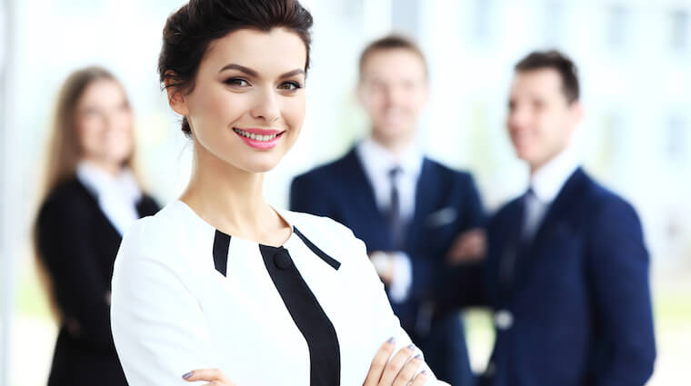 Professional Business Woman with Tailored Suit with Crossarms