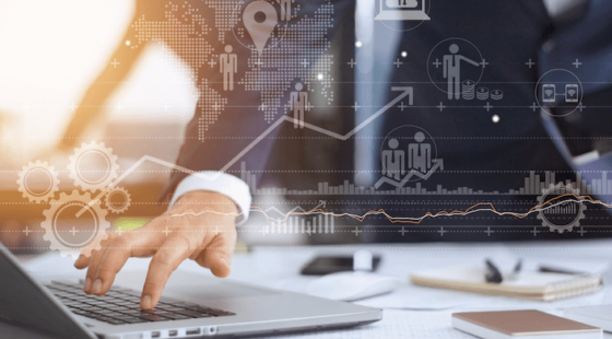 Male Hand Typing on a Laptop Overlayed with Business Icons