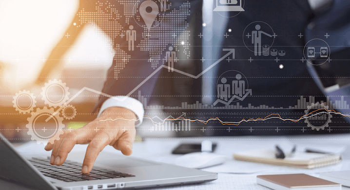 Male Hand Typing on a Laptop Overlayed with Business Icons